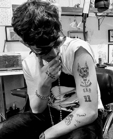 His tattoos